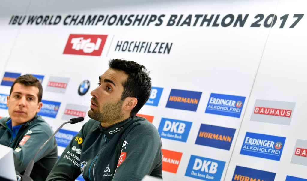 French Martin Fourcade (R) attends a press conference on the eve of the Biathlon World Championship, on February 7, 2017 at Hochfilzen, Austria. / AFP PHOTO / APA / BARBARA GINDL / Austria OUT